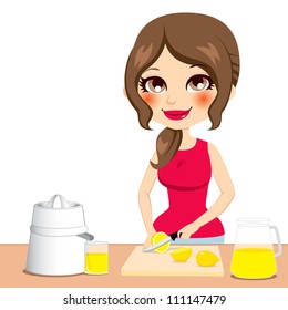 Beautiful brunette woman squeezing lemons preparing healthy refreshing cold lemonade