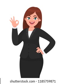 Beautiful business woman showing or gesturing okay, OK sign. Woman in formal black suit isolated white background. Businesswoman concept illustration in vector cartoon style.