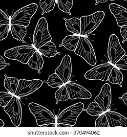 Beautiful butterfly on a black background. Vector seamless pattern