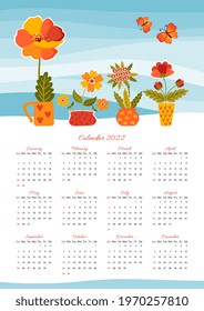 Beautiful calendar template for 2022 year with flowers in pots and butterflies.