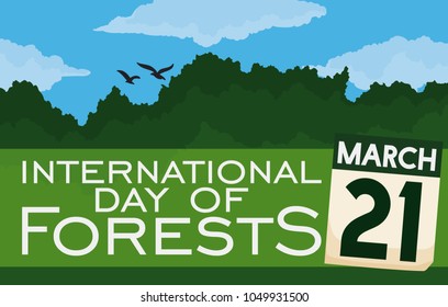 Beautiful canopy view with blue sky, clouds and some birds, a greeting label and loose-leaf calendar with reminder date for International Day of Forests in March 21.