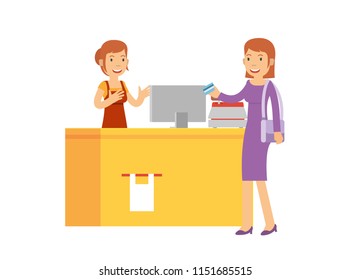 Beautiful cashier are serve the customer in the supermarket