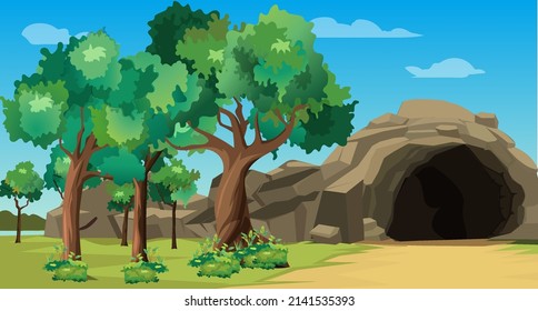 A beautiful cave in a day light inside a jungle with green tree in a forest with blue sky.