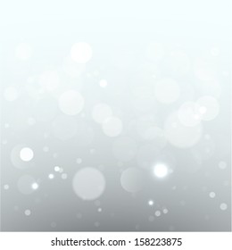 beautiful celebration background with white blurred lights