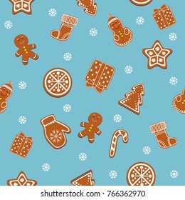 Beautiful Christmas ginger cookies, gingerbread cookies on blue background. Seamless texture, background.