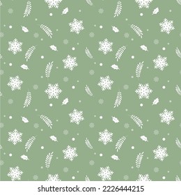 Beautiful Christmas seamless pattern with snowflakes and leaves in sage green background