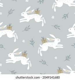 Hermosa Navidad sin fisuras, patrón repetido. Salto de conejos blancos, lienzos con cajas de regalo y ramas de abetos. Fondo azul. Diseño plano de invierno escandinavo. Scrapbooking, papel, tela.