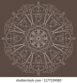The beautiful circular symmetrical white pattern on a gray-brown background.