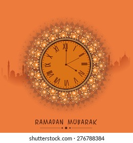 Beautiful clock indicating time for prayers, on mosque silhouetted orange background for holy month of prayers Ramadan Mubarak celebrations. 