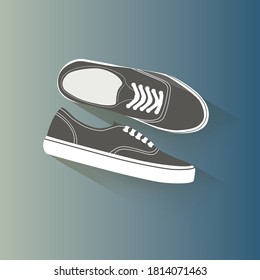 beautiful colored pair of shoes on a colored background