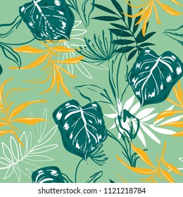 Beautiful Colorful Hand sketch and drawing tropical flowers and leaves seamless pattern in  vector for fashion fabric and all prints on green mint background color