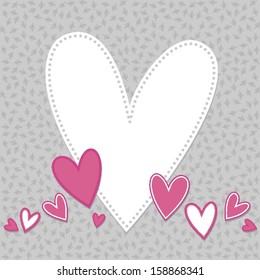 beautiful colorful hearts in a row with big white one with blank place for your text on gray background with little leaves