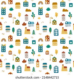 Beautiful colorful seamless pattern with cartoon houses and adds elements: plants, hills, stones, streetlight, rainbow. Cute vector illustration for fabric, textile, background, wallpaper.