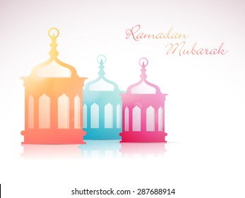 Beautiful colorful traditional lanterns on glossy background for Islamic holy month of prayers, Ramadan Mubarak celebration.