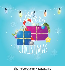 Beautiful composition of christmas items on blue snowy background with christmas lights.