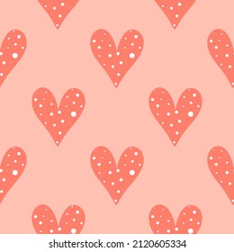 Beautiful coral seamless pattern with hearts vector illustration. Hearts with white dots background. Template for fabric, packaging, paper and design