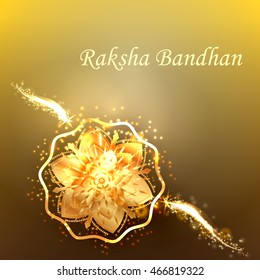 Beautiful creative rakhi on shiny background for Indian festival of brother and sister love