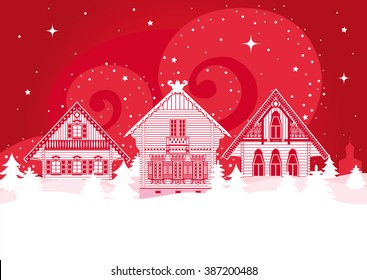 Beautiful creative Russian village houses, an Orthodox  Christian church, trees and snowdrifts on a background of a blizzard and the night sky.
