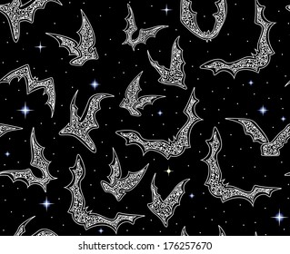 Beautiful curling vector seamless pattern with flying bats and stars