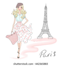 Beautiful, cute shopping girl in pink skirt on a background with Eiffel Tower in Paris.