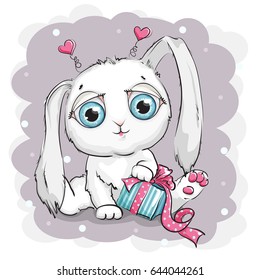 Beautiful and cute white rabbit with gift box
