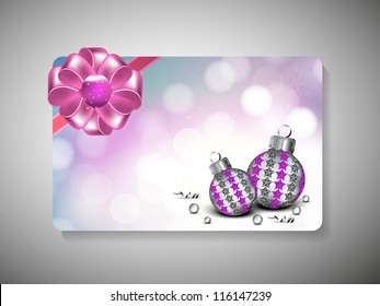 Beautiful decorated gift card with Xmas balls, snow flakes and ribbon for Merry Christmas celebration. EPS 10.