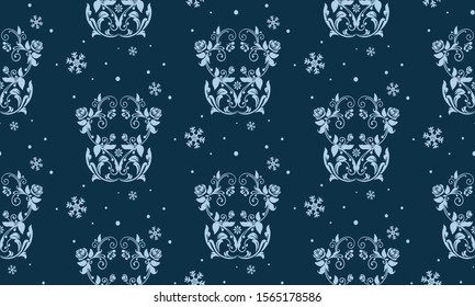 Beautiful decorative christmas seamless pattern, flower and leaves color light blue.