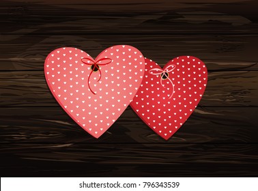 Beautiful decorative pink heart made of paper with flight and bow. Valentine's Day. Greeting card. Vector illustration on a wooden background.