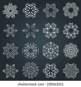 Beautiful decorative vector white winter snowflakes on a dark blue background