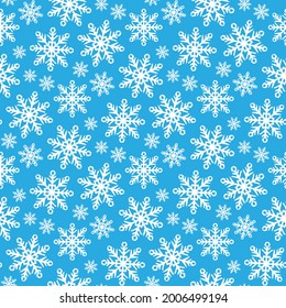 Beautiful different small white snowflakes isolated on blue background. Cute Christmas seamless pattern. Vector simple flat graphic hand drawn illustration. Texture.