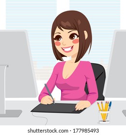 Beautiful digital artist woman working with graphic tablet on computer