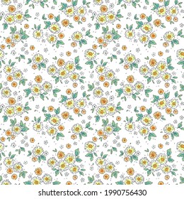 Beautiful ditsy vintage floral pattern in small flowers. Small beige and yellow flowers. White background. Liberty style print. Floral seamless background. The elegant the template for fashion prints.