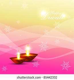 beautiful diwali diya on artistic background