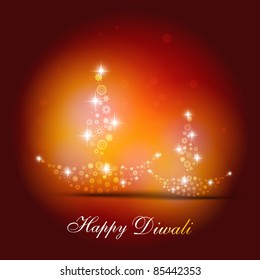 beautiful diwali diya on artistic background