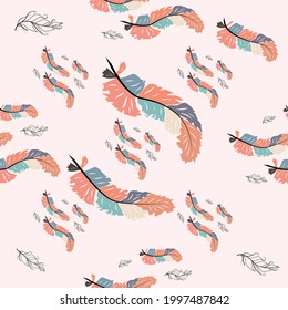 Hermoso doodle sin fisuras de plumas de boho en un fondo rosado. Estilo dibujado a mano. Textura sin inconvenientes