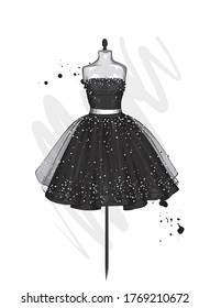 A beautiful dress with a lush skirt. Clothes on a mannequin. Vintage outfit for the girl. Vector illustration. Fashion, style, clothing and accessories.
