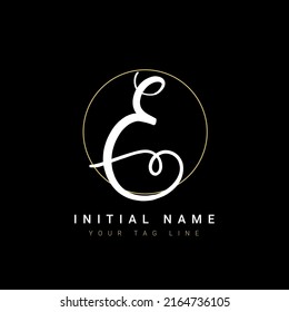 Beautiful E Initial handwriting logo vector. Hand lettering for designs.