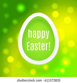Beautiful Easter egg on green background with glow and bokeh particles

