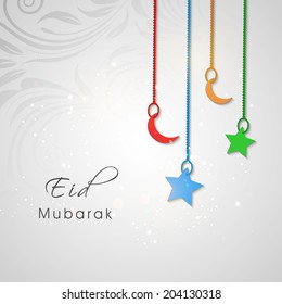 Beautiful Eid Mubarak greeting card design with hanging colourful moon and star on floral decorated grey background. 