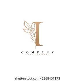 
hermosa y elegante letra dorada diseño del logo I con flor de hoja de lujo. Tipografía, monograma. florecer. apto para logotipos de belleza, invitaciones, salones, boutiques, empresas, bodas