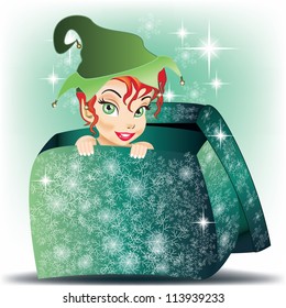 Beautiful Elf smiling girl coming out from gift wrap