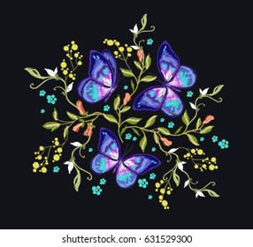 Beautiful embroidery floral pattern with flowers, butterflies. Vector traditional folk fashion ornament on black background for your design design. 