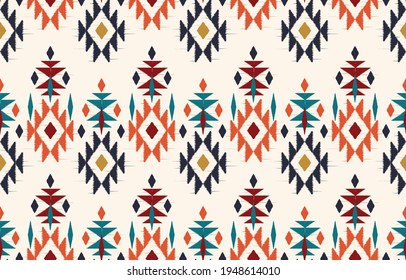 Beautiful Ethnic abstract ikat art. Seamless pattern in tribal, folk embroidery, and Mexican style.Aztec geometric art ornament print.Design for carpet, wallpaper, clothing, wrapping, fabric, cover 