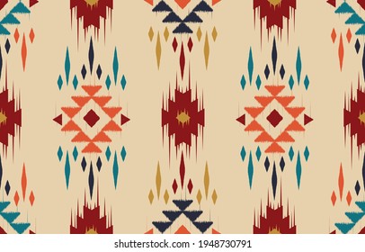 Beautiful Ethnic abstract ikat art. Seamless pattern in tribal, folk embroidery, and Mexican style.Aztec geometric art ornament print.Design for carpet, wallpaper, clothing, wrapping, fabric, cover 