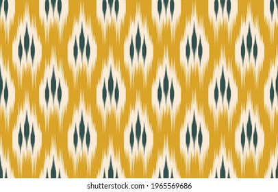 Beautiful ethnic abstract ikat art. Seamless pattern in tribal, folk embroidery, Cute Mexican style. Aztec geometric art ornament print. Design for carpet, wallpaper, clothing, wrapping, fabric,cover.