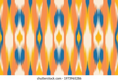 Beautiful ethnic abstract ikat art. Seamless pattern in tribal, folk embroidery, Cute Mexican style. Aztec geometric art ornament print. Design for carpet, wallpaper, clothing, wrapping, fabric,cover.