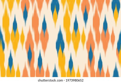 Beautiful ethnic abstract ikat art. Seamless pattern in tribal, folk embroidery, Cute Mexican style. Aztec geometric art ornament print. Design for carpet, wallpaper, clothing, wrapping, fabric,cover.