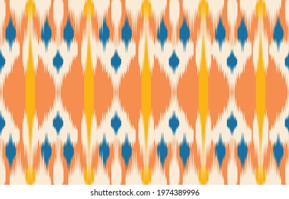 Beautiful ethnic abstract ikat art. Seamless pattern in tribal, folk embroidery, Cute Mexican style. Aztec geometric art ornament print. Design for carpet, wallpaper, clothing, wrapping, fabric,cover.