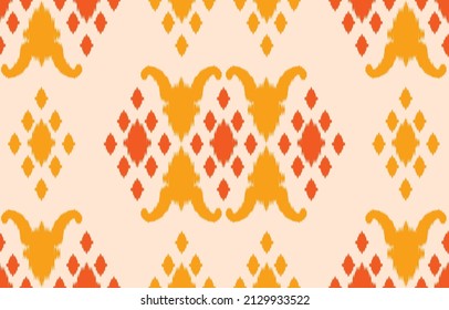 Beautiful Ethnic abstract ikat art. The seamless yellow pattern in tribal, folk embroidery damask style. geometric art ornament print. Design for carpet, wallpaper, clothing, wrapping, fabric, cover.