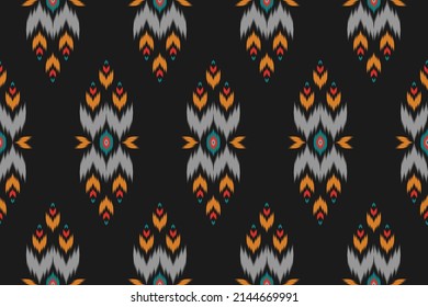 Hermoso arte de patrones étnicos. Ikat es un patrón sin fisuras tradicional. de estilo americano y mexicano. Diseño para fondo, papel pintado, ilustración vectorial, tela, ropa, alfombra, textil, batik, bordado.